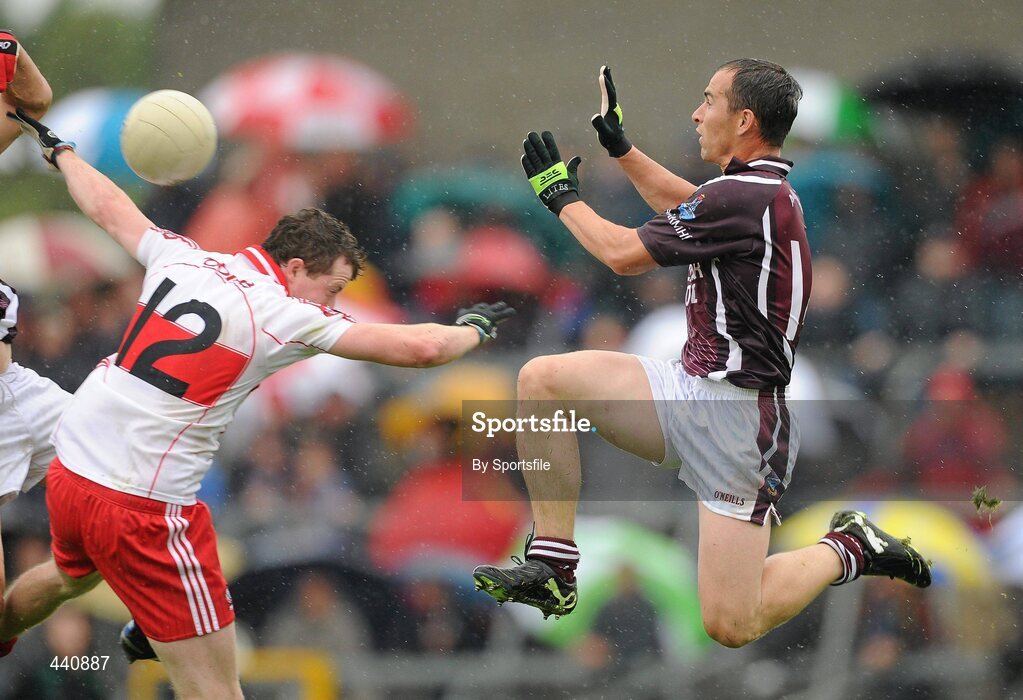 10 July 2010; Dessie Dolan, Westmeath, in action against Barry McGoldrick, Derry. GAA Football All-Ireland Senior Championship Qualifier, Round 2, Westmeath v Derry, Cusack Park, Mullingar, Co. Westmeath. Photo by Sportsfile