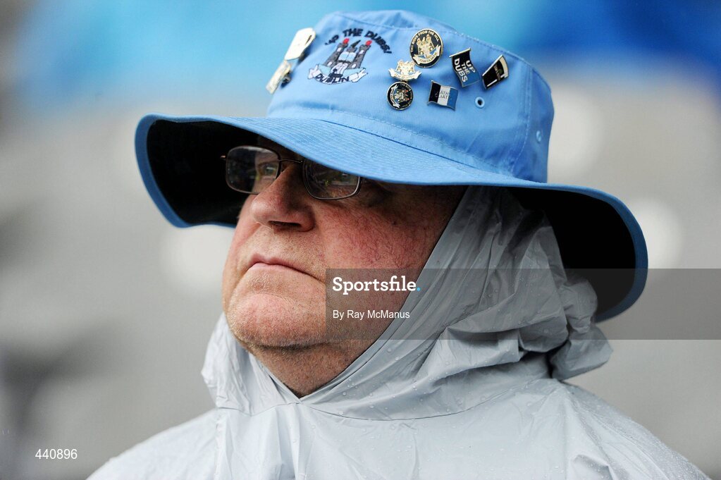 10 July 2010; Dublin supporter Mick Wheelan, Thomas St., shelters from the rain in the Cusack Stand. GAA Football All-Ireland Senior Championship Qualifier, Round 2, Dublin v Tipperary, Croke Park, Dublin. Picture credit: Ray McManus / SPORTSFILE
