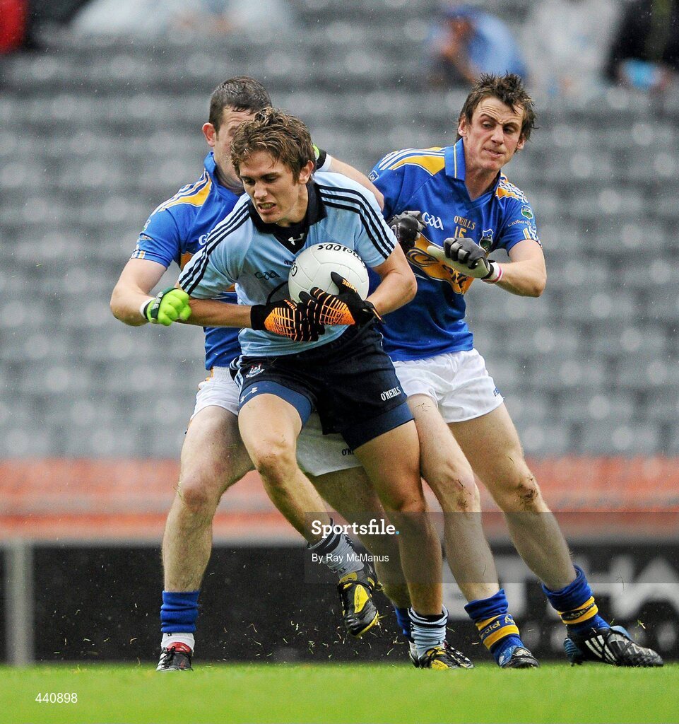 10 July 2010; Michael Fitzsimons, Dublin, in action against Barry Grogan and Conor Sweeney, Tipperary. GAA Football All-Ireland Senior Championship Qualifier, Round 2, Dublin v Tipperary, Croke Park, Dublin. Picture credit: Ray McManus / SPORTSFILE
