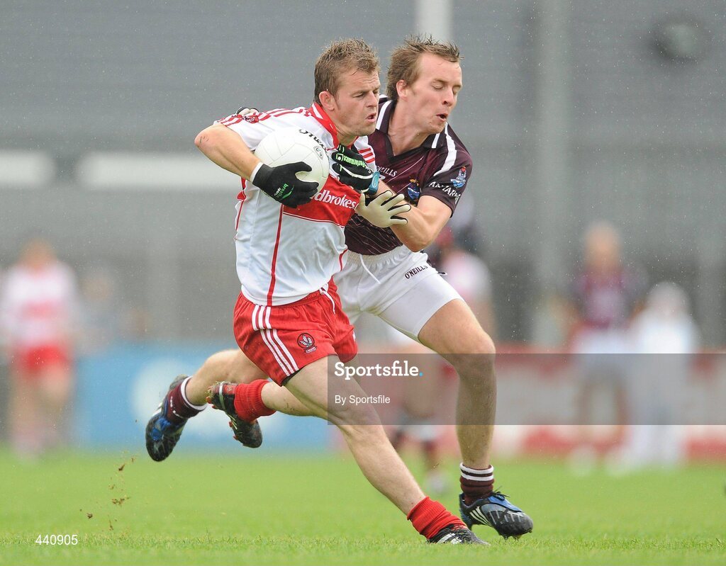 10 July 2010; Raymond Wilkinson, Derry, in action against Doran Harte, Westmeath. GAA Football All-Ireland Senior Championship Qualifier, Round 2, Westmeath v Derry, Cusack Park, Mullingar, Co. Westmeath. Photo by Sportsfile