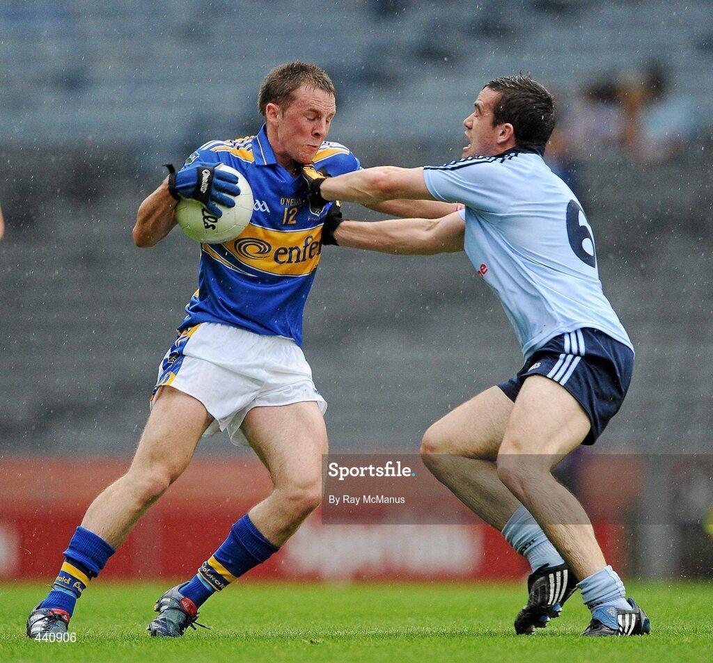 10 July 2010; Peter Acheson, Tipperary, in action against Ger Brennan, Dublin. GAA Football All-Ireland Senior Championship Qualifier, Round 2, Dublin v Tipperary, Croke Park, Dublin. Picture credit: Ray McManus / SPORTSFILE