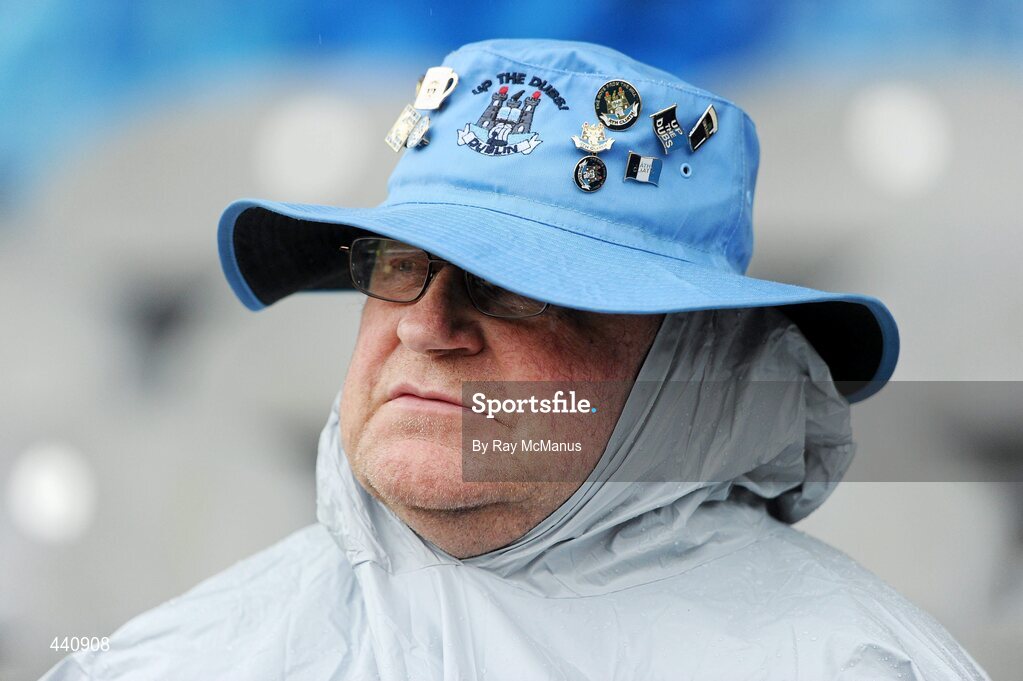 10 July 2010; Dublin supporter Mick Wheelan, Thomas St., shelters from the rain in the Cusack Stand. GAA Football All-Ireland Senior Championship Qualifier, Round 2, Dublin v Tipperary, Croke Park, Dublin. Picture credit: Ray McManus / SPORTSFILE