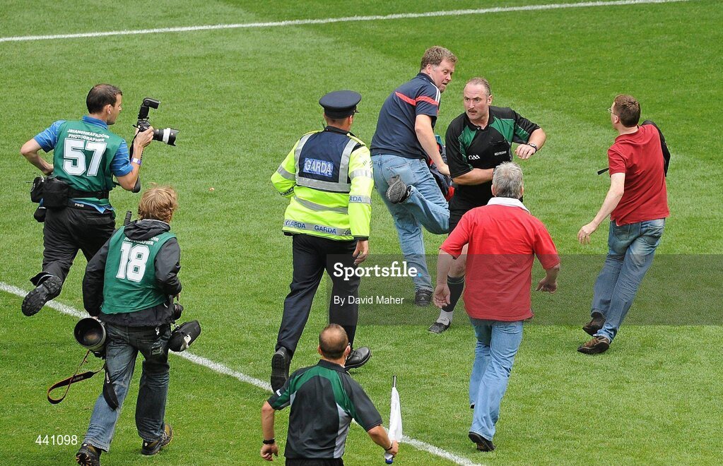 11 July 2010; Spectators confront referee Martin Sludden at the end of the game. Leinster GAA Football Senior Championship Final, Meath v Louth, Croke Park, Dublin. Picture credit: David Maher / SPORTSFILE