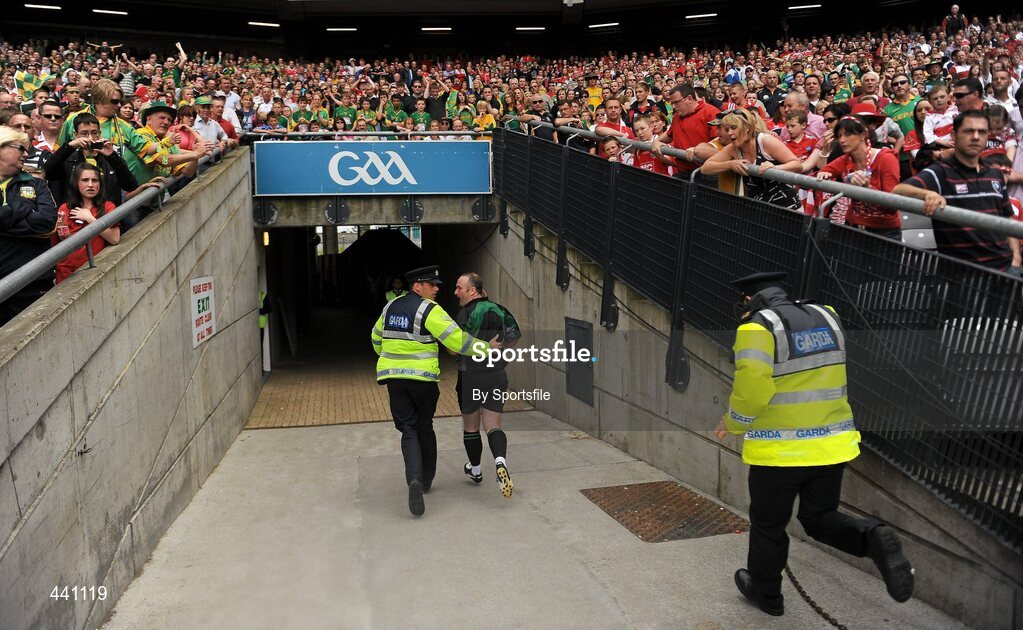 11 July 2010; Referee Martin Sludden is escorted off the field by Gardai. Leinster GAA Football Senior Championship Final, Meath v Louth, Croke Park, Dublin. Photo by Sportsfile