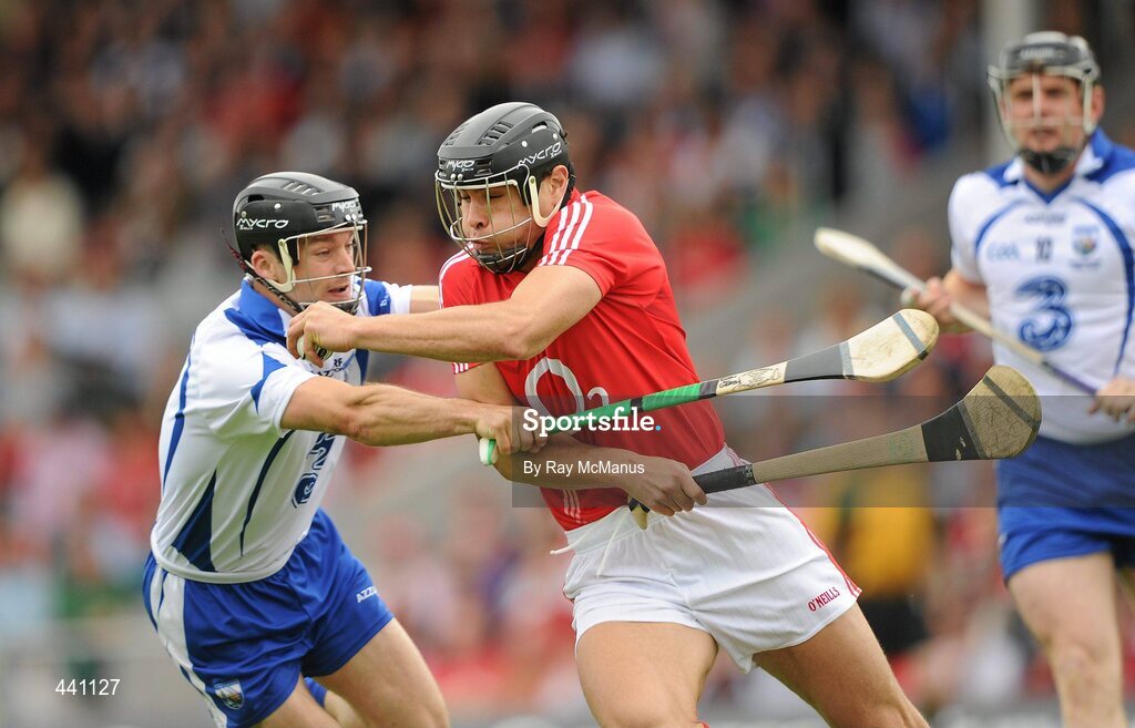 11 July 2010; Sean Óg Ó hAilpín, Cork, in action against Eoin McGrath, Waterford. Munster GAA Hurling Senior Championship Final, Cork v Waterford, Semple Stadium, Thurles, Co. Tipperary. Picture credit: Ray McManus / SPORTSFILE
