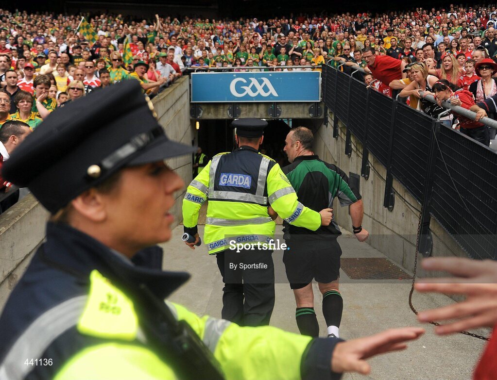 11 July 2010; Referee Martin Sludden is escorted off the field by Gardai after the game. Leinster GAA Football Senior Championship Final, Meath v Louth, Croke Park, Dublin. Photo by Sportsfile