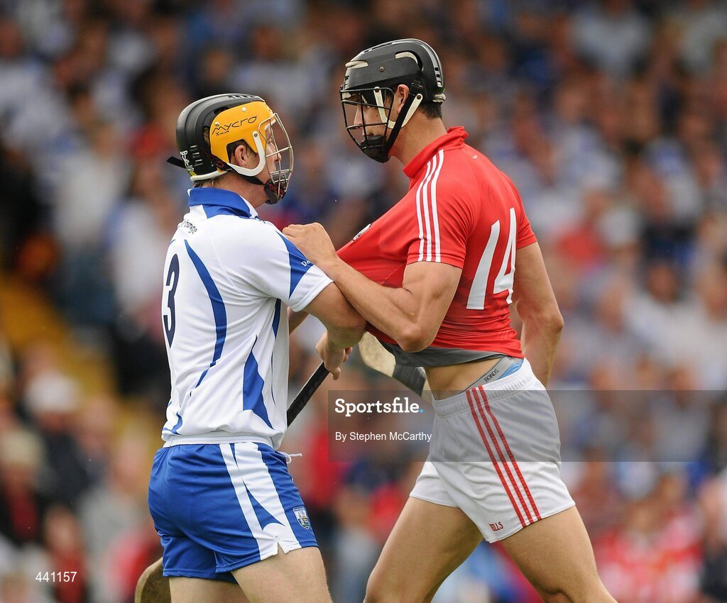 11 July 2010; Aisake Ó hAilpín, Cork, and Liam Lawlor, Waterford, tussle off the ball. Munster GAA Hurling Senior Championship Final, Cork v Waterford, Semple Stadium, Thurles, Co. Tipperary. Picture credit: Stephen McCarthy / SPORTSFILE
