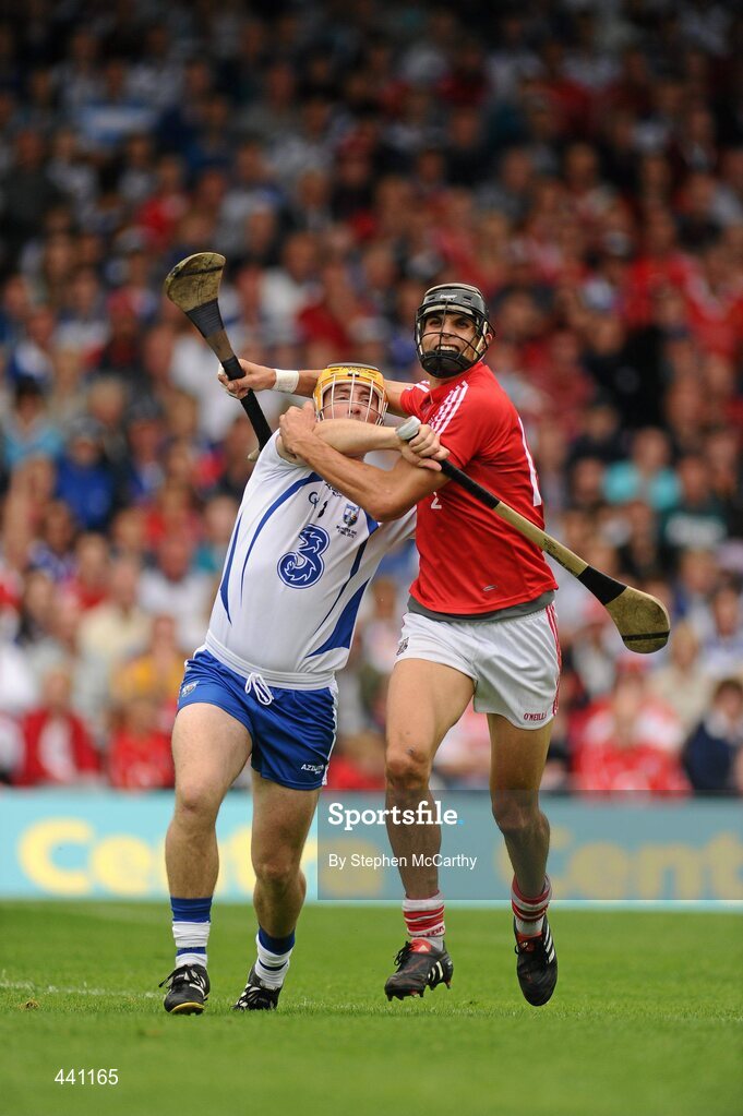 11 July 2010; Aisake Ó hAilpín, Cork, and Liam Lawlor, Waterford, tussle off the ball. Munster GAA Hurling Senior Championship Final, Cork v Waterford, Semple Stadium, Thurles, Co. Tipperary. Picture credit: Stephen McCarthy / SPORTSFILE