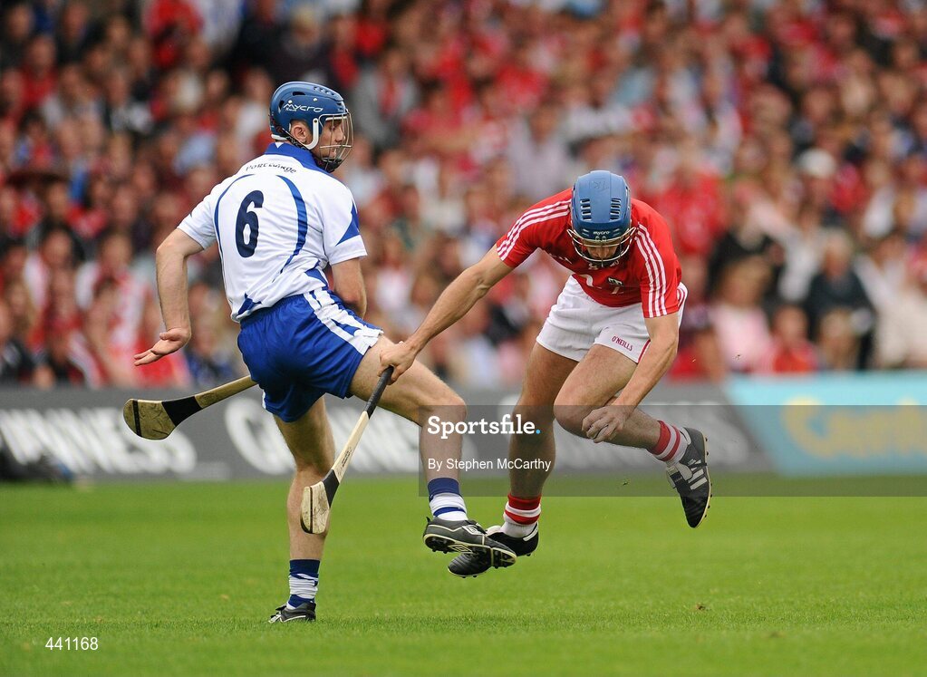11 July 2010; Tom Kenny, Cork, is tripped by Michael Walsh, Waterford. Munster GAA Hurling Senior Championship Final, Cork v Waterford, Semple Stadium, Thurles, Co. Tipperary. Picture credit: Stephen McCarthy / SPORTSFILE