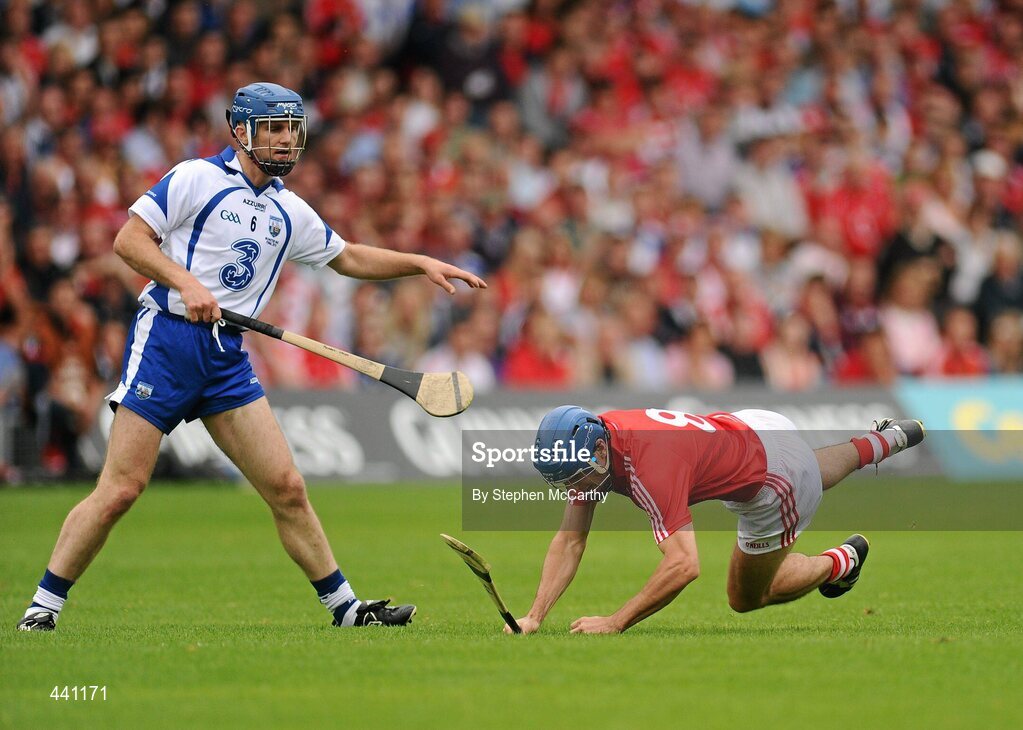 11 July 2010; Tom Kenny, Cork, is tripped by Michael Walsh, Waterford. Munster GAA Hurling Senior Championship Final, Cork v Waterford, Semple Stadium, Thurles, Co. Tipperary. Picture credit: Stephen McCarthy / SPORTSFILE