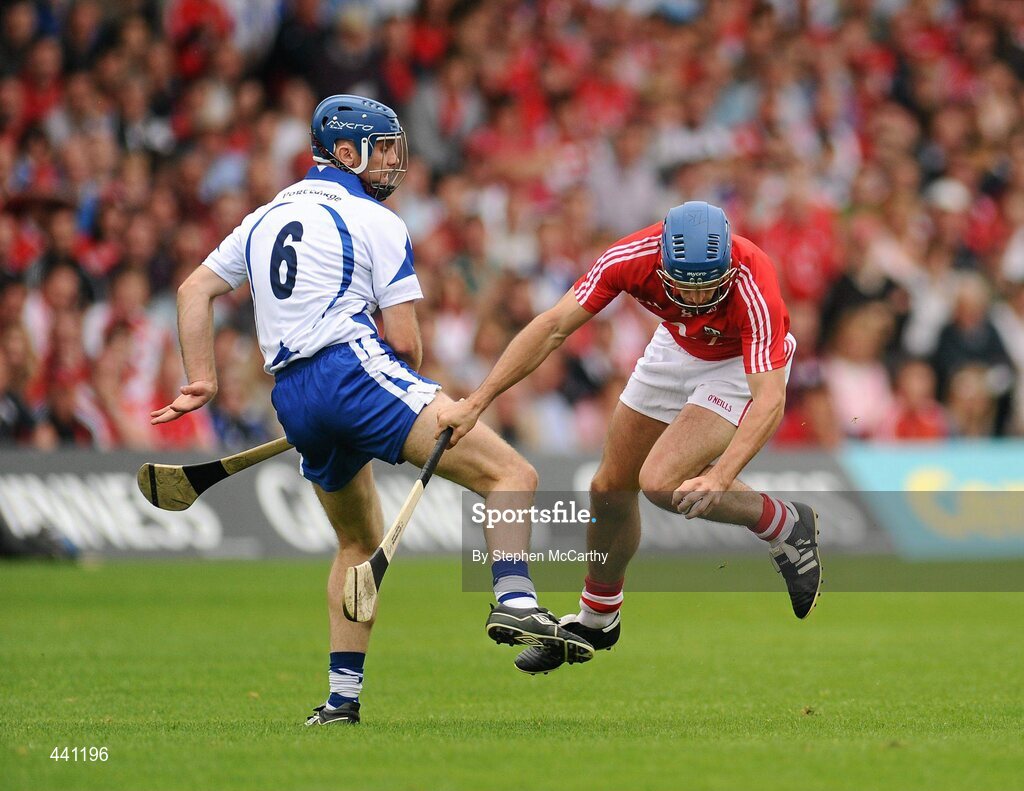 11 July 2010; Tom Kenny, Cork, is tripped by Michael Walsh, Waterford. Munster GAA Hurling Senior Championship Final, Cork v Waterford, Semple Stadium, Thurles, Co. Tipperary. Picture credit: Stephen McCarthy / SPORTSFILE