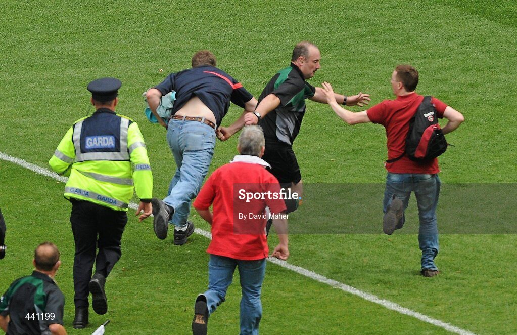 11 July 2010; Spectators confront referee Martin Sludden at the end of the game. Leinster GAA Football Senior Championship Final, Meath v Louth, Croke Park, Dublin. Picture credit: David Maher / SPORTSFILE
