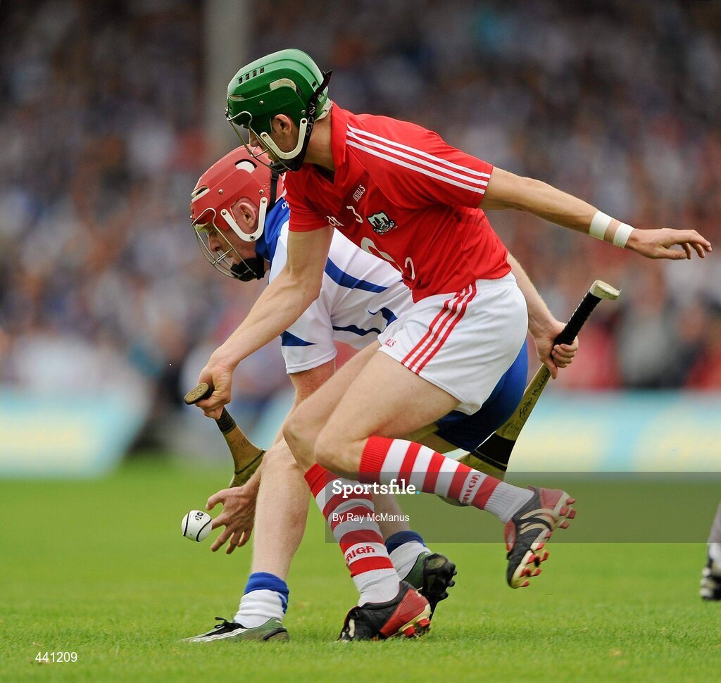 11 July 2010; Eoin Cadogan, Cork, in action against John Mullane, Waterford. Munster GAA Hurling Senior Championship Final, Cork v Waterford, Semple Stadium, Thurles, Co. Tipperary. Picture credit: Ray McManus / SPORTSFILE