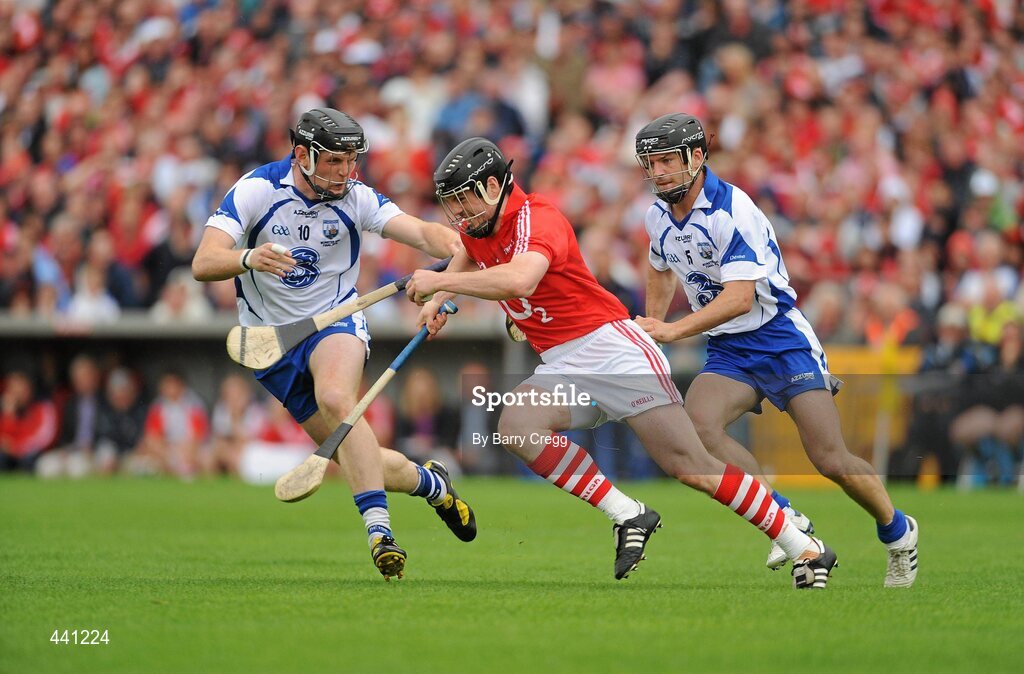 11 July 2010; Shane O' Neill, Cork, in action against Kevin Moran. left, and Eoin Mcgrath, Waterford. Munster GAA Hurling Senior Championship Final, Cork v Waterford, Semple Stadium, Thurles, Co. Tipperary. Picture credit: Barry Cregg / SPORTSFILE