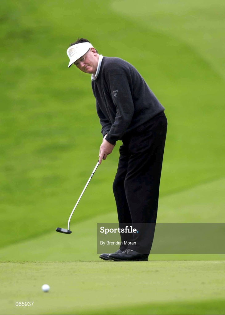 28 June 2001; Eamonn Darcy of Ireland putts on the 9th green, his final hole, where he finished with a round of 65, six shots under par, during day one of the Murphy's Irish Open at Fota Island Golf Club in Cork. Photo by Brendan Moran/Sportsfile