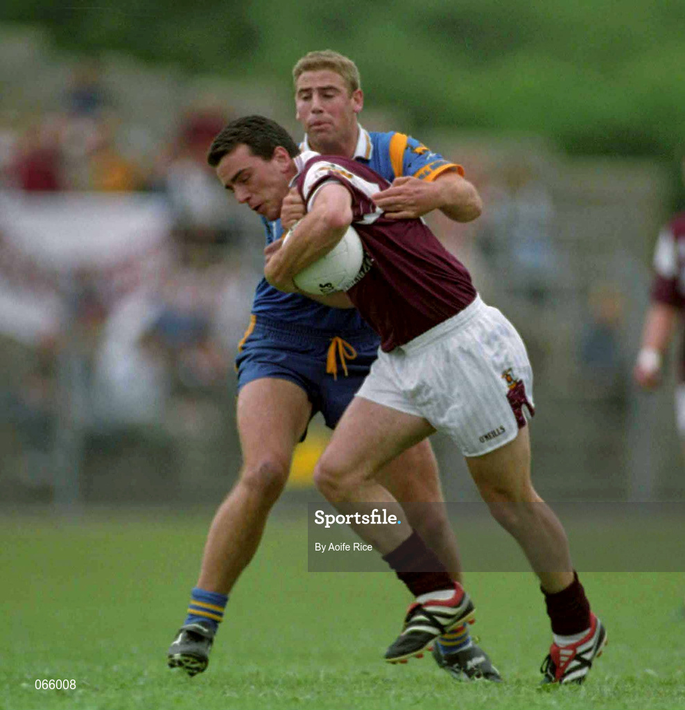 30 June 2001; Padraig Joyce of Galway is tackled by Barry O'Donovan of Wicklow during the Bank of Ireland All-Ireland Senior Football Championship Qualifier Round 2 match between Wicklow and Galway at Aughrim County Ground in Aughrim, Wicklow. Photo by Aoife Rice/Sportsfile