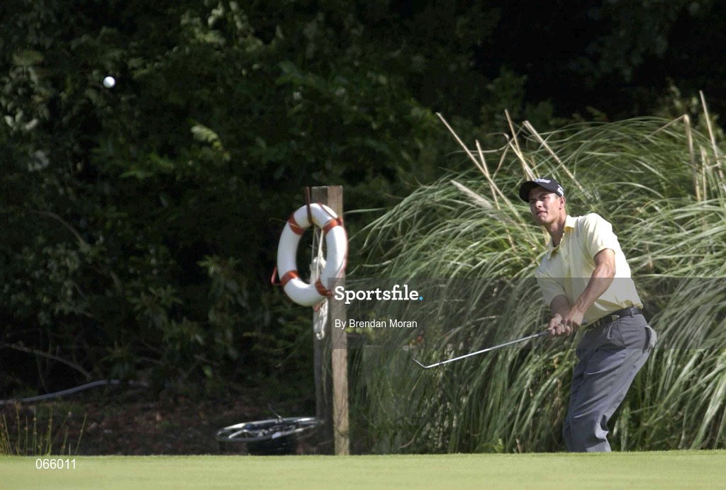 30 June 2001; Adam Scott of Australia plays from the water, where he took a drop which resulted in a bogey, on the 18th during day three of the Murphy's Irish Open at Fota Island Golf Club in Cork. Photo by Brendan Moran/Sportsfile