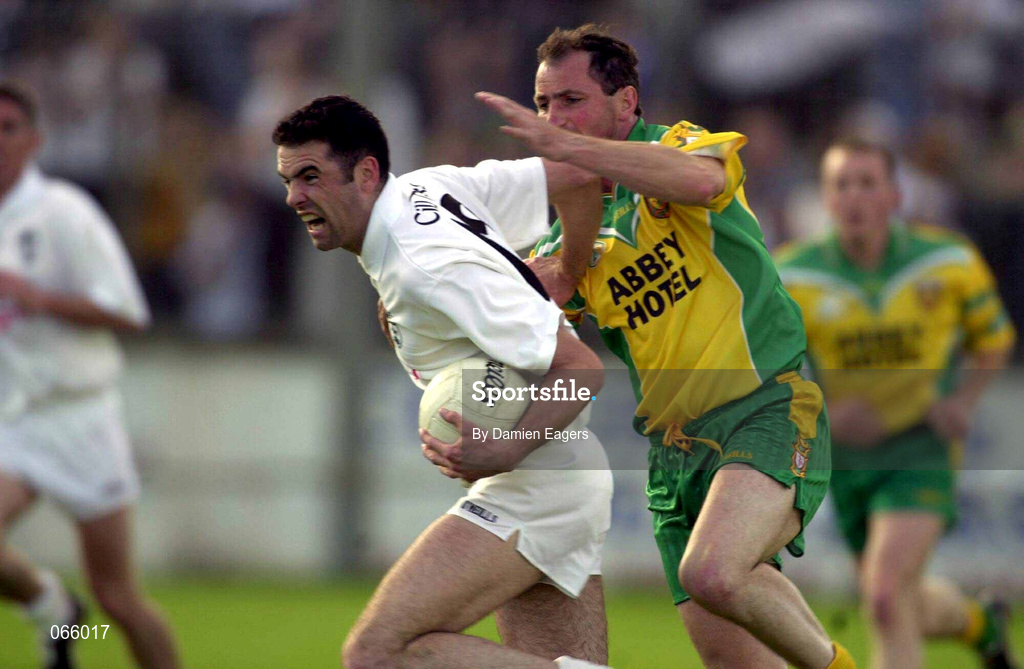 30 June 2001; Dermot Earley of Kildare in action against Noel McGinley of Donegal during the Bank of Ireland All-Ireland Championship Qualifier match between Kildare and Donegal at St Conleths Park in Newbridge, Kildare. Photo by Damien Eagers/Sportsfile