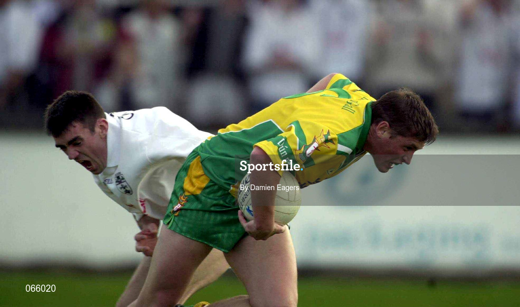 30 June 2001; Martin Coll of Donegal in action against John Doyle of Kildare during the Bank of Ireland All-Ireland Championship Qualifier match between Kildare and Donegal at St Conleths Park in Newbridge, Kildare. Photo by Damien Eagers/Sportsfile