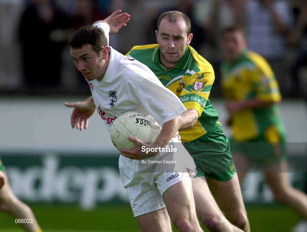 30 June 2001; Padraig Brennan of Kildare in action against Paddy Campbell of Donegal during the Bank of Ireland All-Ireland Championship Qualifier match between Kildare and Donegal at St Conleths Park in Newbridge, Kildare. Photo by Damien Eagers/Sportsfile