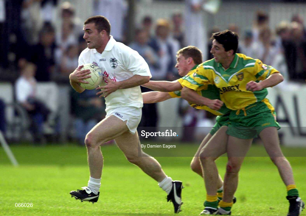30 June 2001; Cormac Davey of Kildare breaks through the Donegal defense during the Bank of Ireland All-Ireland Championship Qualifier match between Kildare and Donegal at St Conleths Park in Newbridge, Kildare. Photo by Damien Eagers/Sportsfile