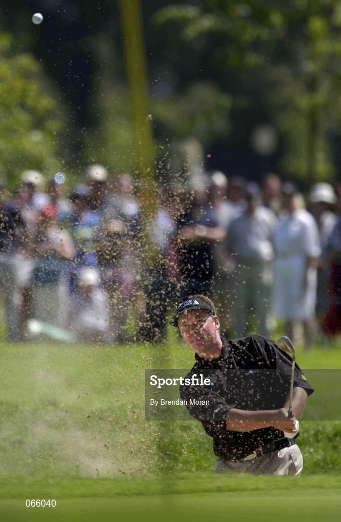 1 July 2001; Darren Clarke of Ireland chips out of a bunker at the 5th during day four of the Murphy's Irish Open at Fota Island Golf Club in Cork. Photo by Brendan Moran/Sportsfile