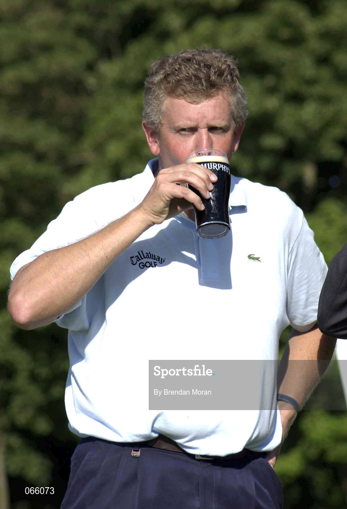 1 July 2001; Colin Montgomerie of Scotland celebrates with a pint of Murphy's following day four of the Murphy's Irish Open at Fota Island Golf Club in Cork. Photo by Brendan Moran/Sportsfile