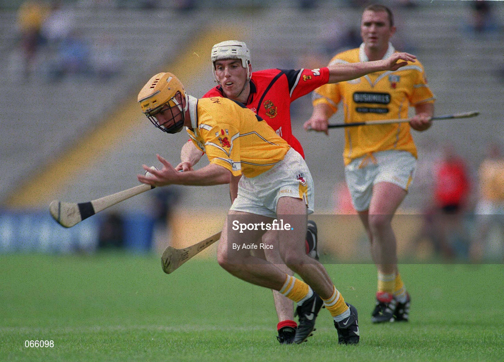 1 July 2001; Ciaran Herron of Antrim in action against Gerard McGrattan of Down during the Bank of Ireland Ulster Senior Football Championship Semi-Final match between Antrim and Down at Casement Park in Belfast. Photo by Aoife Rice/Sportsfile
