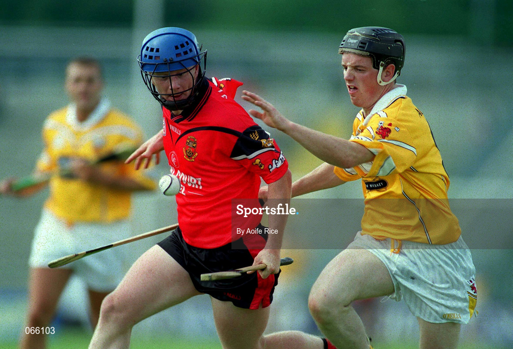 1 July 2001; Gerard Adair of Down is tackled by Aidan Delargey of Antrim during the Bank of Ireland Ulster Senior Football Championship Semi-Final match between Antrim and Down at Casement Park in Belfast. Photo by Aoife Rice/Sportsfile