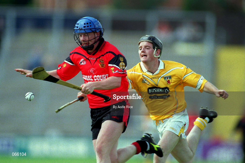 1 July 2001; Gerard Adair of Down is tackled by Aidan Delargey of Antrim during the Bank of Ireland Ulster Senior Football Championship Semi-Final match between Antrim and Down at Casement Park in Belfast. Photo by Aoife Rice/Sportsfile
