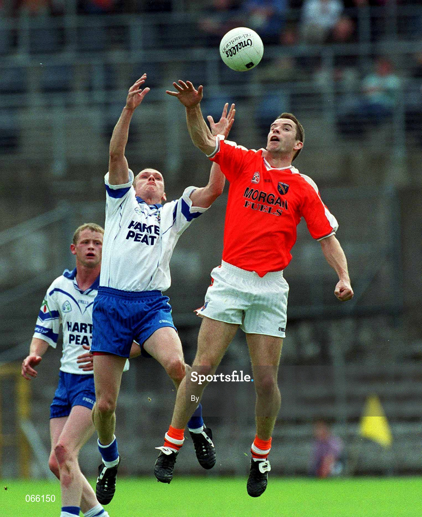 30 June 2001; Paul McGrane, Armagh, goes up against Monaghan's Jason Hughes. Monaghan v Armagh, Bank of Ireland Senior Football Championship Qualifier, St. Tighearnach's Park, Clones, Co. Monaghan. Picture credit; David Maher / SPORTSTFILE