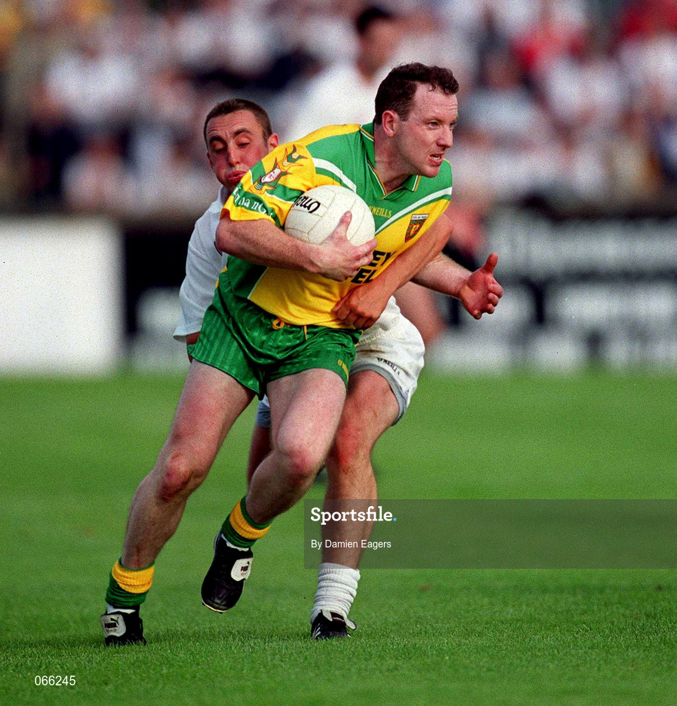 30 June 2001; Adrien Sweeney of Donegal in action against Kenny Duane of Kildare during the Bank of Ireland All-Ireland Championship Qualifier match between Kildare and Donegal at St Conleths Park in Newbridge, Kildare. Photo by Damien Eagers/Sportsfile