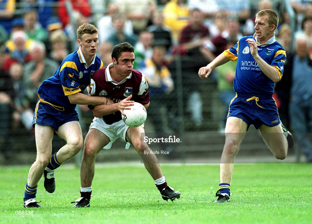 30 June 2001; Alan Kerins of Galway in action against Tom Burke, left, and Ronan Coffey of Wicklow during the Bank of Ireland All-Ireland Senior Football Championship Qualifier Round 2 match between Wicklow and Galway at Aughrim County Ground in Aughrim, Wicklow. Photo by Aoife Rice/Sportsfile