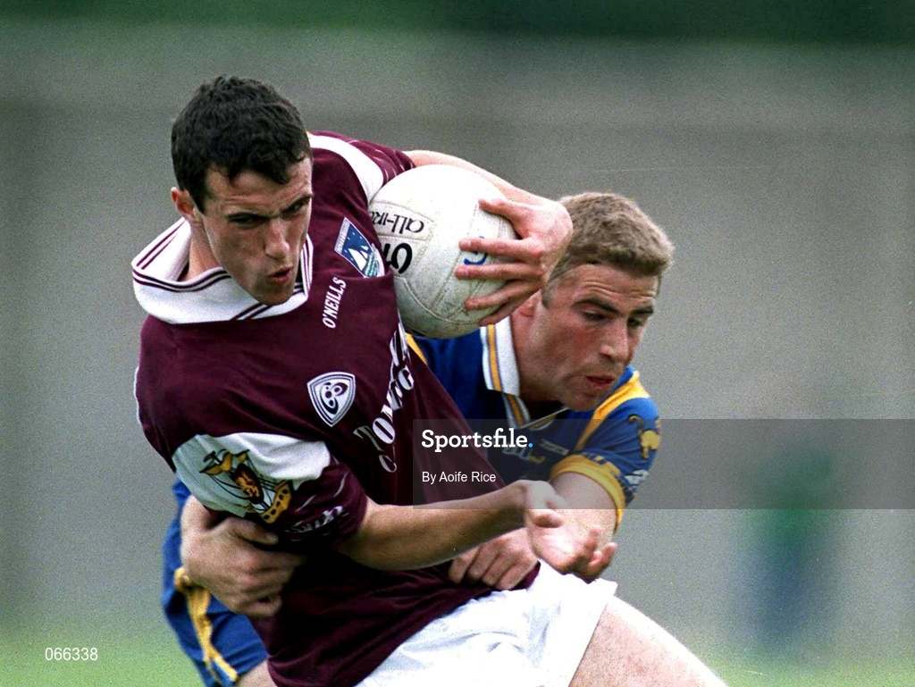30 June 2001; Joe Bergin of Galway is tackled by Barry O'Donovan of Wicklow during the Bank of Ireland All-Ireland Senior Football Championship Qualifier Round 2 match between Wicklow and Galway at Aughrim County Ground in Aughrim, Wicklow. Photo by Aoife Rice/Sportsfile
