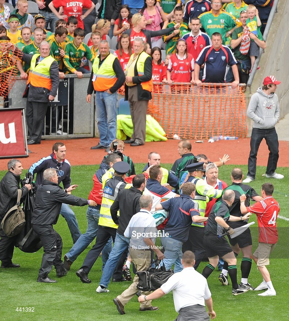 11 July 2010; Members of An Garda Síochána step in as spectators confront referee Martin Sludden at the end of the game. Leinster GAA Football Senior Championship Final, Meath v Louth, Croke Park, Dublin. Picture credit: David Maher / SPORTSFILE