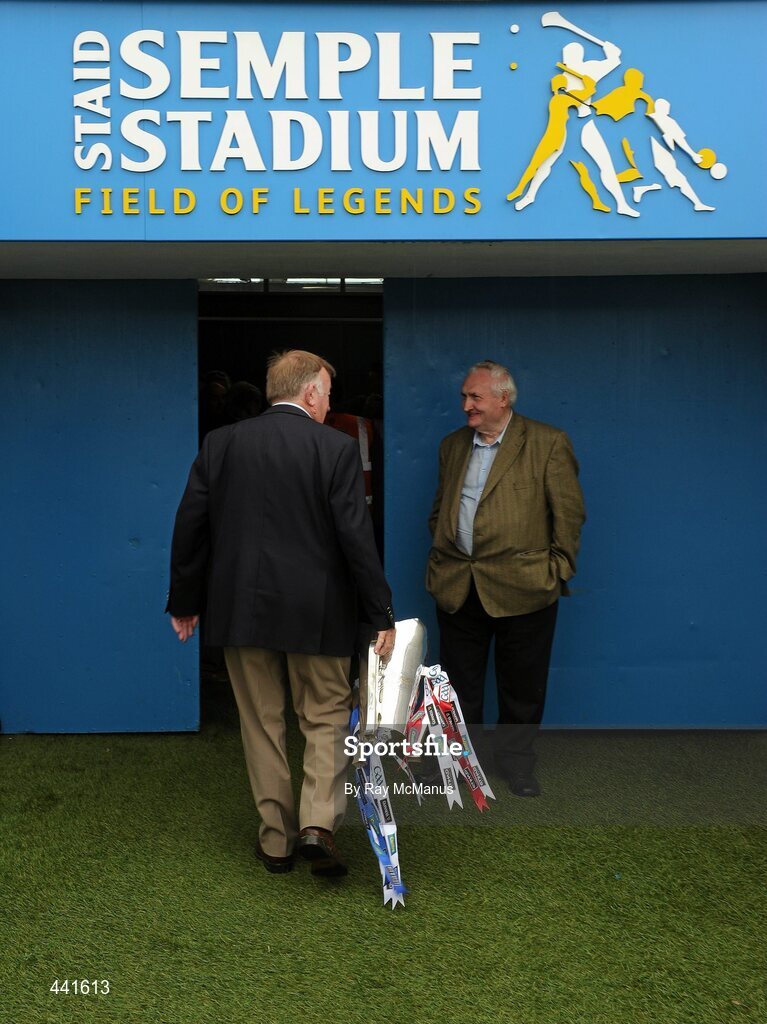 11 July 2010; Munster PRO, Jim Forbes, leaves the field with the Munster Hurling Final Trophy. Munster GAA Hurling Senior Championship Final, Cork v Waterford, Semple Stadium, Thurles, Co. Tipperary. Picture credit: Ray McManus / SPORTSFILE