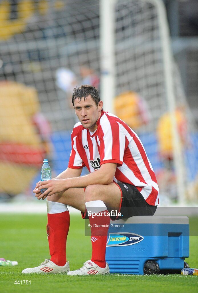 13 July 2010; Sunderland's Daryl Murphy relaxes on a cooler box after warming down with team-mates at half-time. Friendly in Aid of Shane Geoghegan Trust, Munster XI v Sunderland AFC, Thomond Park, Limerick. Picture credit: Diarmuid Greene / SPORTSFILE