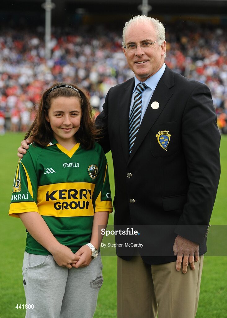 11 July 2010; Meabh Lynch, Tralee, Co. Kerry, with Sean Walsh, Chairman of the Munster Council, after winning a car following the conclusion of the Munster GAA half time draws. Munster GAA Hurling Senior Championship Final, Cork v Waterford, Semple Stadium, Thurles, Co. Tipperary. Picture credit: Stephen McCarthy / SPORTSFILE