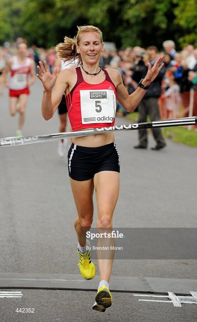 17 July 2010; Maria McCambidge crosses the line to win the Lifestyle Sports - adidas Irish Runner 5 Mile Race. The Phoenix Park, Dublin. Picture credit: Brendan Moran / SPORTSFILE
