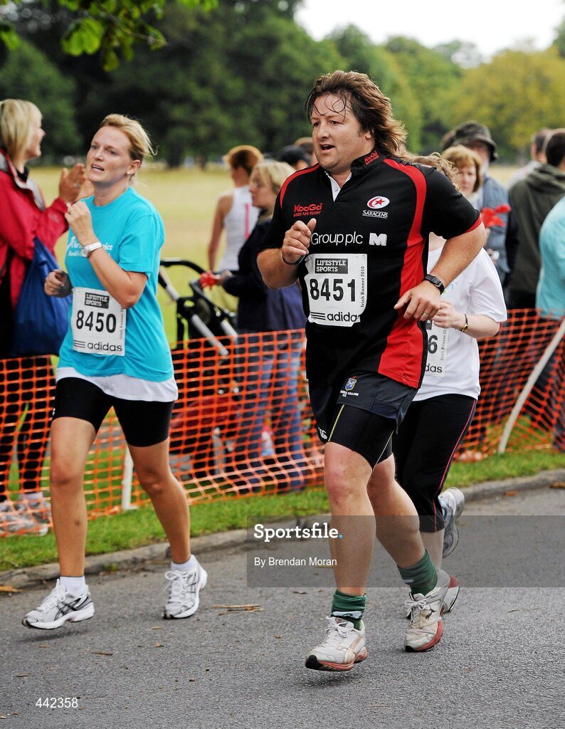 17 July 2010; Caroline and Shane Byrne, from Wicklow, in action during the Lifestyle Sports - adidas Irish Runner 5 Mile Race. The Phoenix Park, Dublin. Picture credit: Brendan Moran / SPORTSFILE