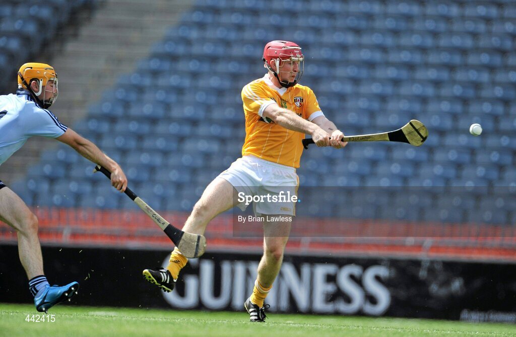 17 July 2010; PJ O'Connell, Antrim, shoots to score his side's first goal despite the attention of Óisín Gough, Dublin. GAA Hurling All-Ireland Senior Championship Phase 3, Dublin v Antrim, Croke Park, Dublin. Picture credit: Brian Lawless / SPORTSFILE