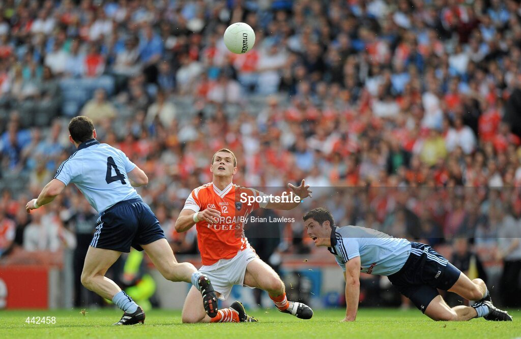 17 July 2010; Gareth Swift, Armagh, in action against Philip McMahon, left, and Rory O'Carroll, Dublin. GAA Football All-Ireland Senior Championship Qualifier Round 3, Dublin v Armagh, Croke Park, Dublin. Picture credit: Brian Lawless / SPORTSFILE