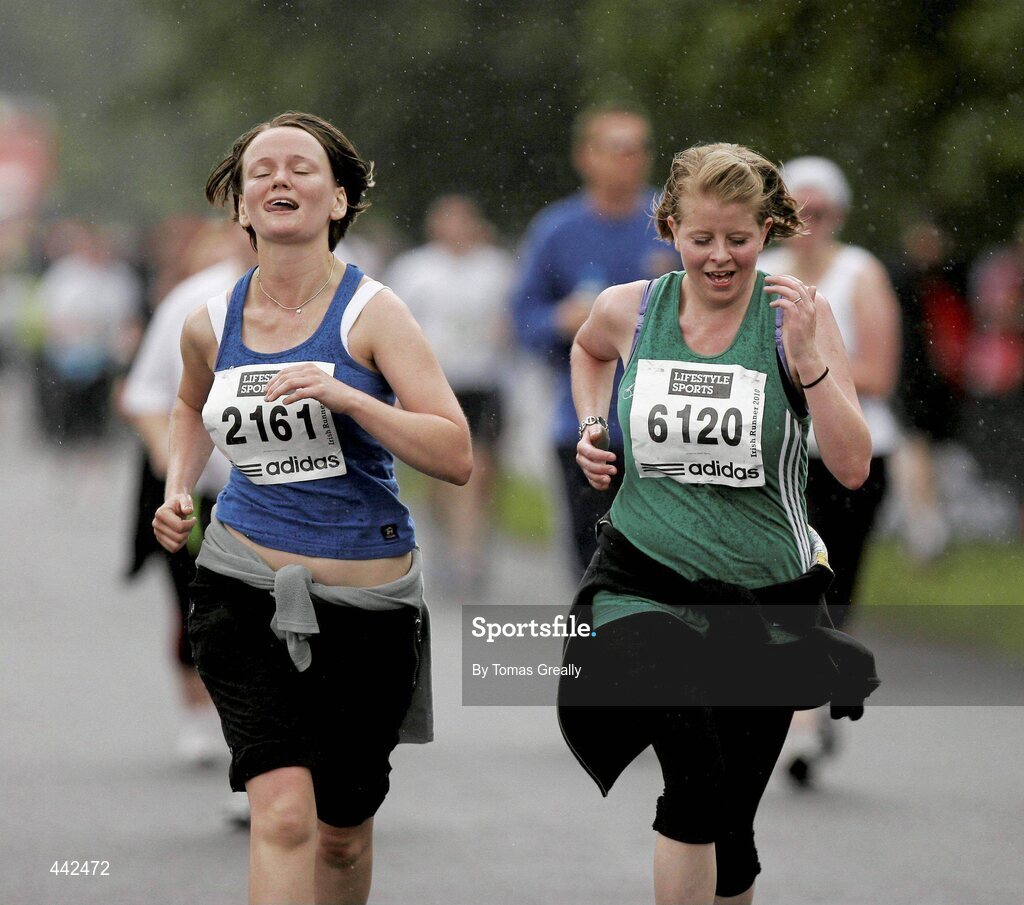 17 July 2010; Mia Bowen, left, from Blackrock, Co. Dublin, and Margaret Parle, from Co. Dublin, in action during the Lifestyle Sports - adidas Irish Runner 5 Mile Race. The Phoenix Park, Dublin. Picture credit: Tomas Greally / SPORTSFILE