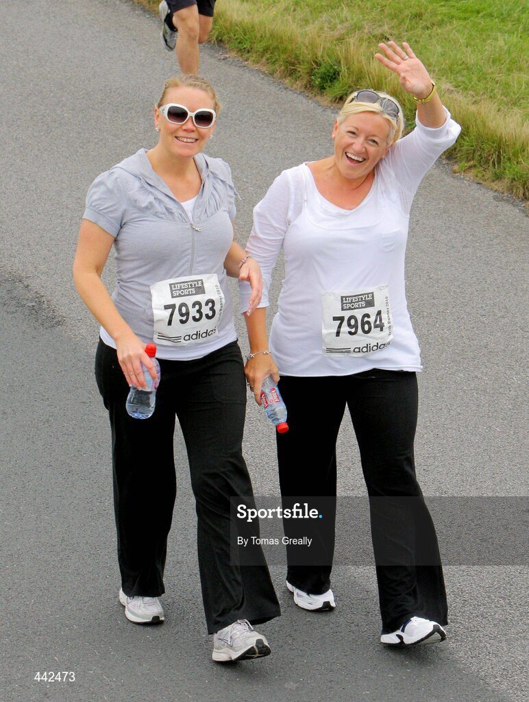 17 July 2010; Carmel Daly, from Co. Roscommon, and Mary Burke, right, from Co. Kildare, in action during the Lifestyle Sports - adidas Irish Runner 5 mile. Phoenix Park, Dublin. Picture credit: Tomas Greally / SPORTSFILE
