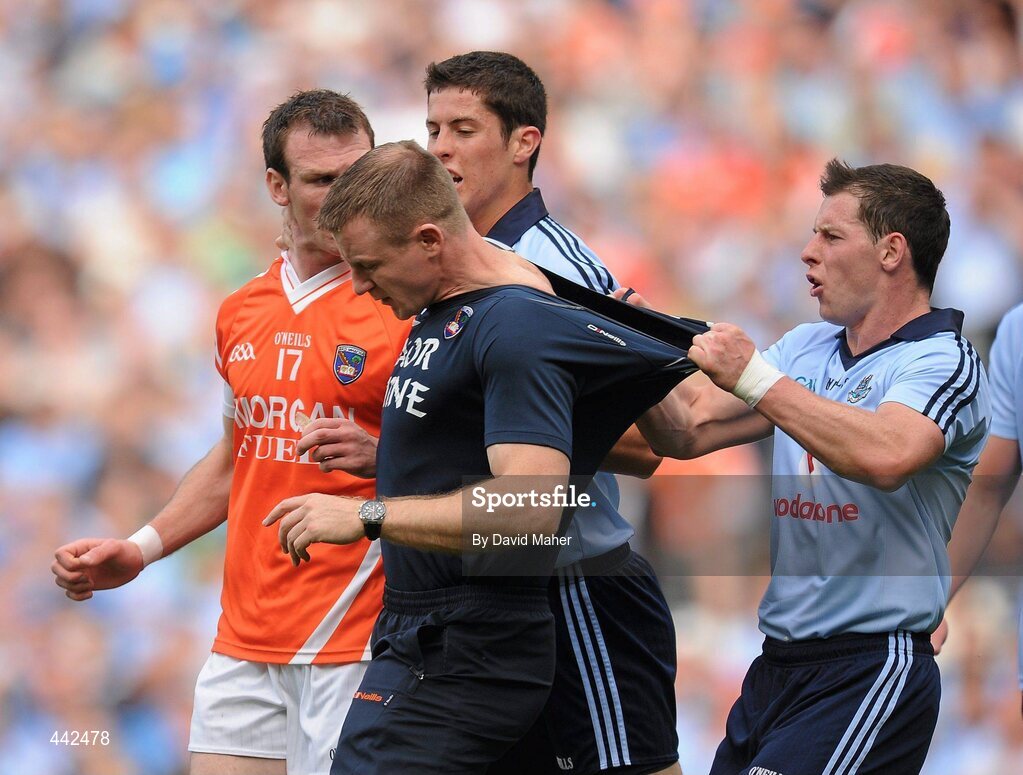 17 July 2010; Philip McMahon, Dublin, clashes with Armagh assistant coach Justin McNulty. GAA Football All-Ireland Senior Championship Qualifier Round 3, Dublin v Armagh, Croke Park, Dublin. Picture credit: David Maher / SPORTSFILE