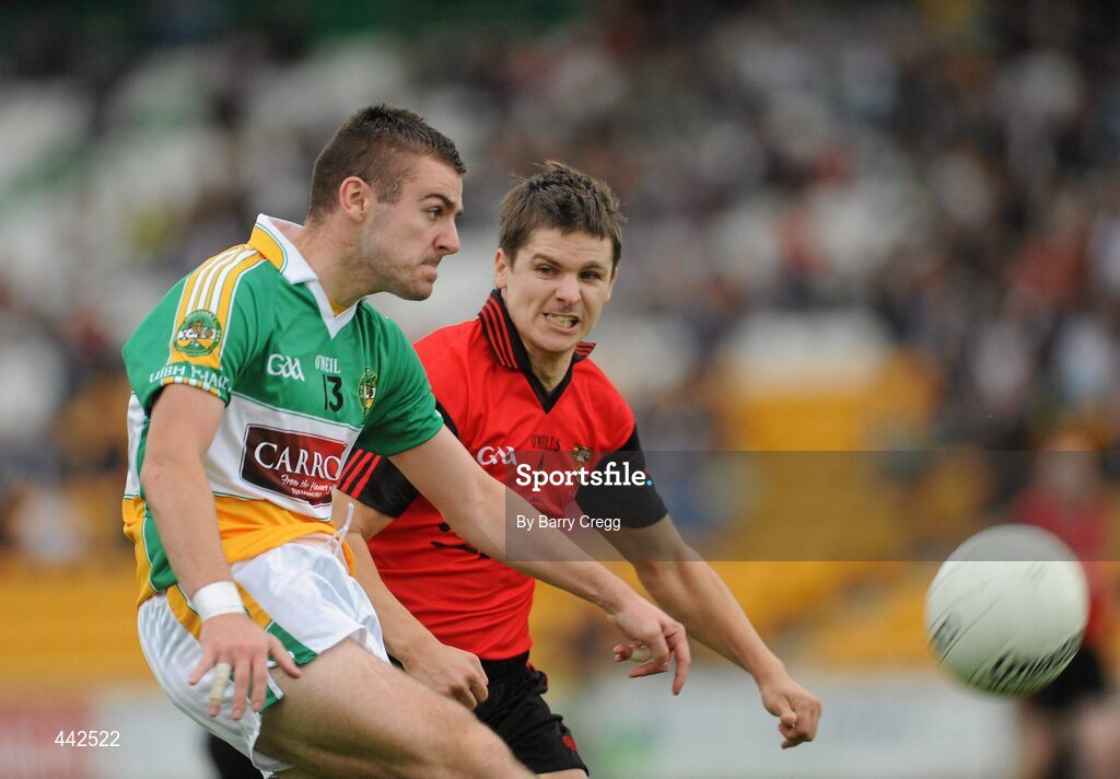 17 July 2010; Ken Casey, Offaly, in action against Damian Rafferty, Down. GAA Football All-Ireland Senior Championship Qualifier Round 3, Down v Offaly, O'Connor Park, Tullamore, Co. Offaly. Picture credit: Barry Cregg / SPORTSFILE