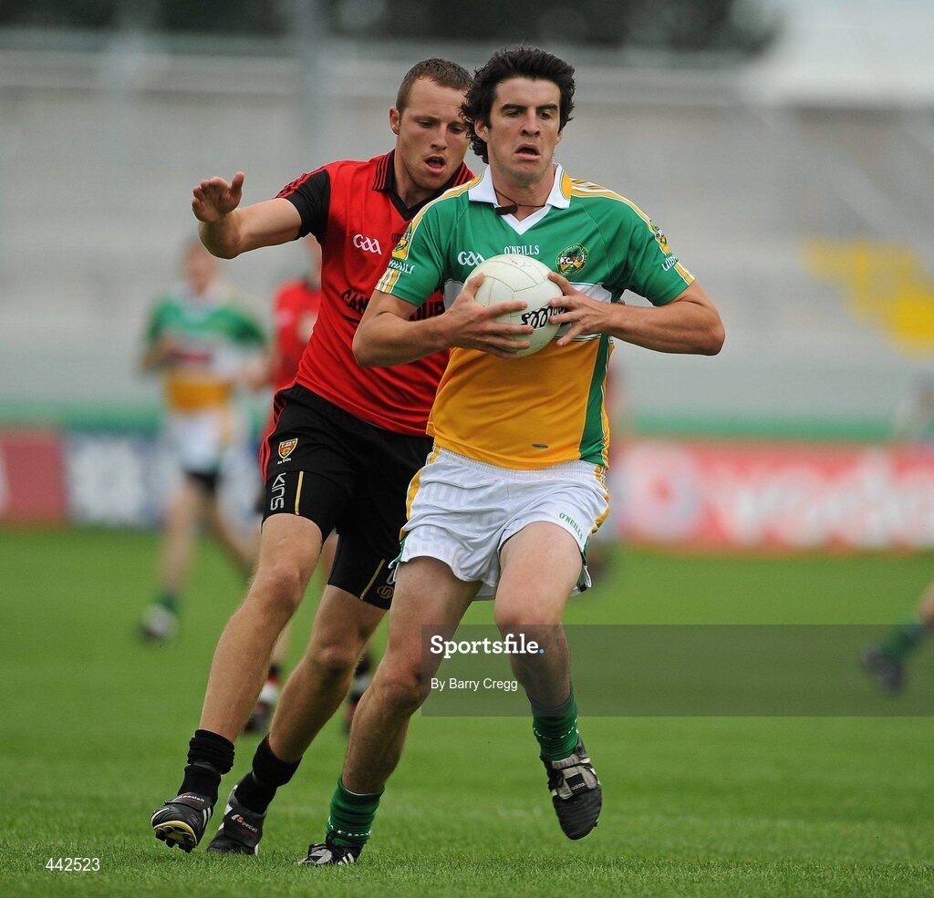 17 July 2010; Richie Dalton, Offaly, in action against Ambrose Rogers, Down. GAA Football All-Ireland Senior Championship Qualifier Round 3, Down v Offaly, O'Connor Park, Tullamore, Co. Offaly. Picture credit: Barry Cregg / SPORTSFILE
