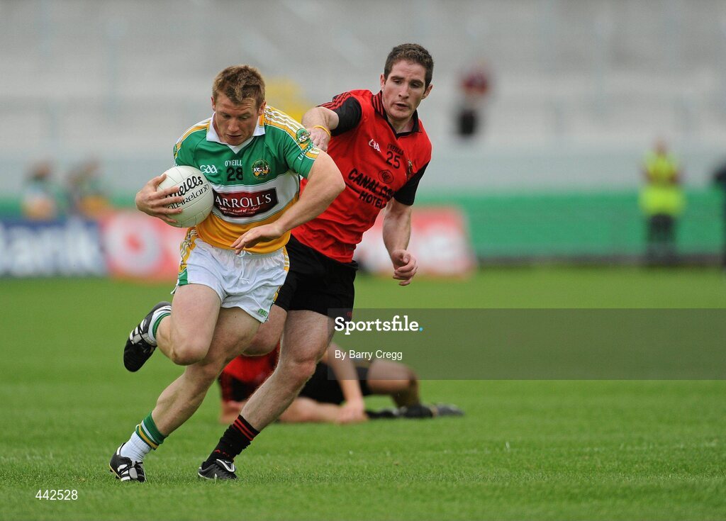 17 July 2010; Seán Ryan, Offaly, in action against Aidan Carr, Down. GAA Football All-Ireland Senior Championship Qualifier Round 3, Down v Offaly, O'Connor Park, Tullamore, Co. Offaly. Picture credit: Barry Cregg / SPORTSFILE