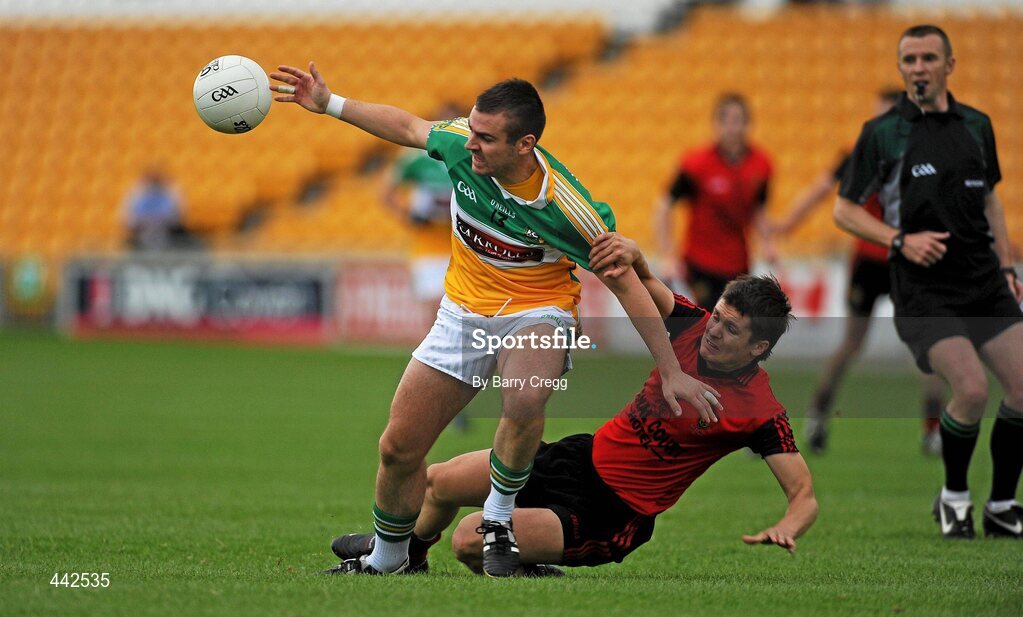 17 July 2010; Ken Casey, Offaly, in action against Damian Rafferty, Down. GAA Football All-Ireland Senior Championship Qualifier Round 3, Down v Offaly, O'Connor Park, Tullamore, Co. Offaly. Picture credit: Barry Cregg / SPORTSFILE