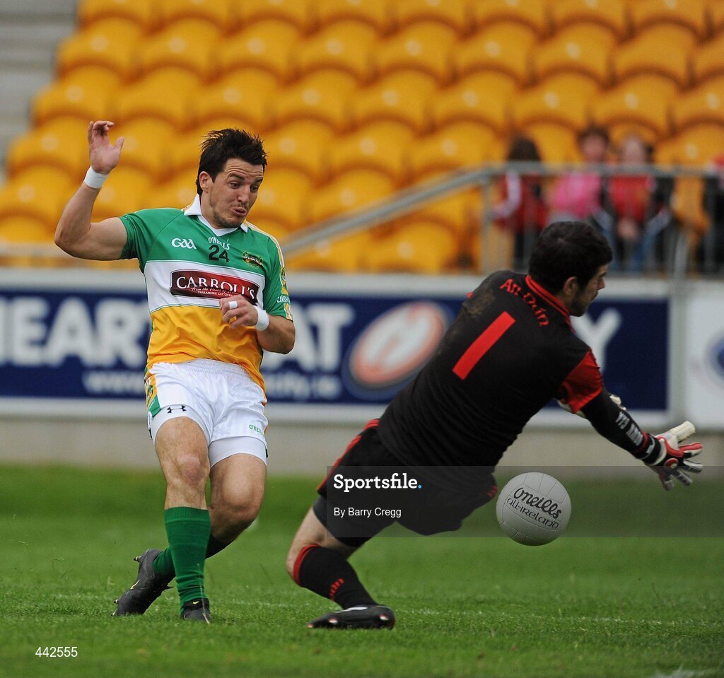 17 July 2010; John Reynolds, Offaly, has a shot saved by Brendan McVeigh, Down. GAA Football All-Ireland Senior Championship Qualifier Round 3, Down v Offaly, O'Connor Park, Tullamore, Co. Offaly. Picture credit: Barry Cregg / SPORTSFILE